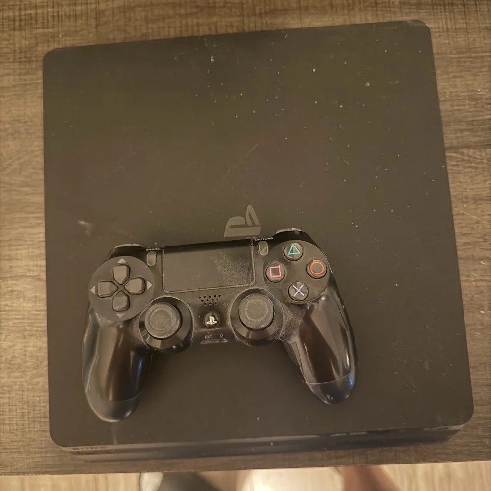Sony Gaming Console with Black Controller